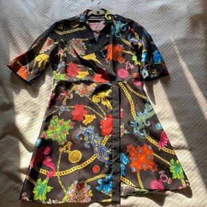 Brand new Versace printed silk wrap dress.